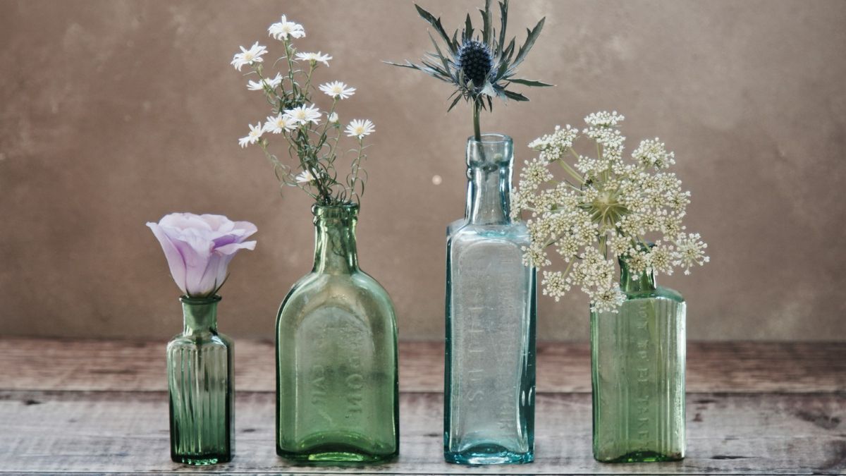 7 idee creative per dare una nuova vita alle bottiglie di vetro - immagine di copertina